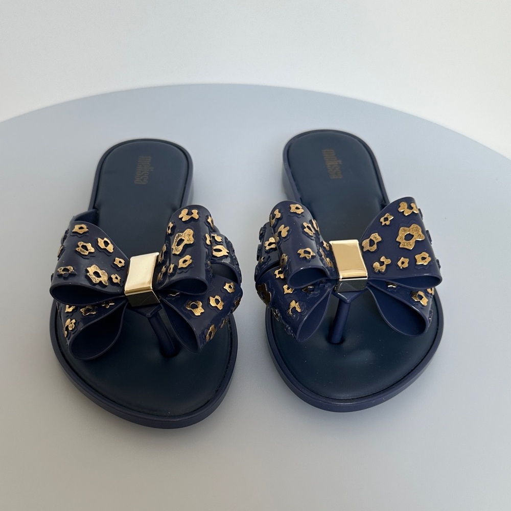 Melissa Navy Sandals with Gold Floral Bow